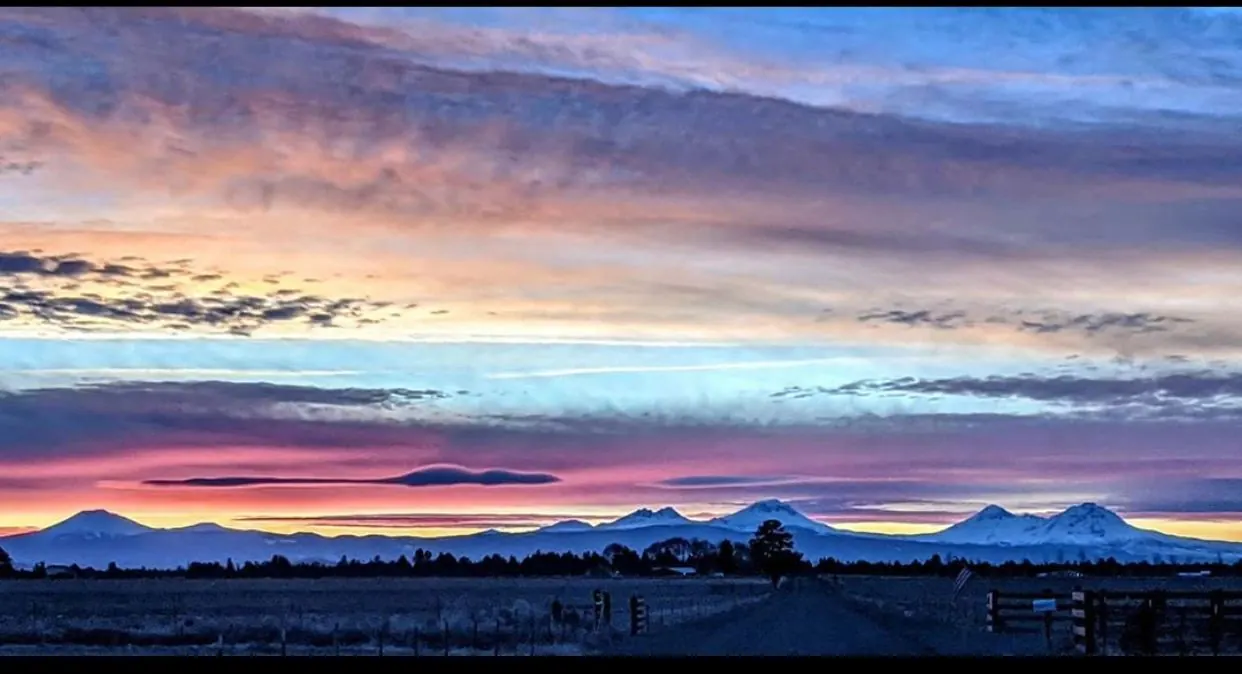 Sunset over the Cascade mountains from the property