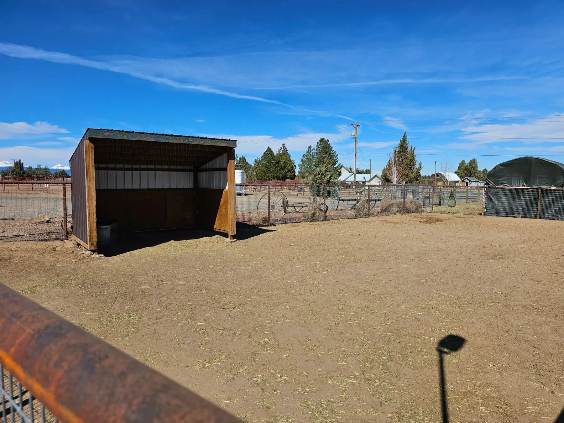A dry lot with a run-in shelter