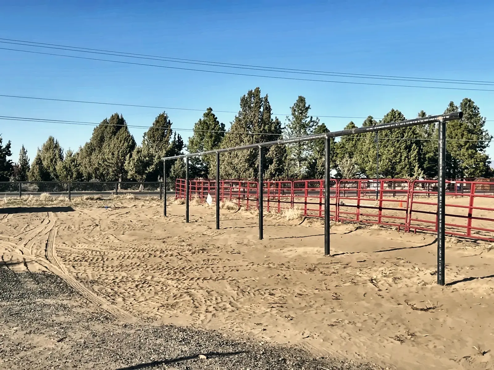 Tie posts next to the outdoor arena
